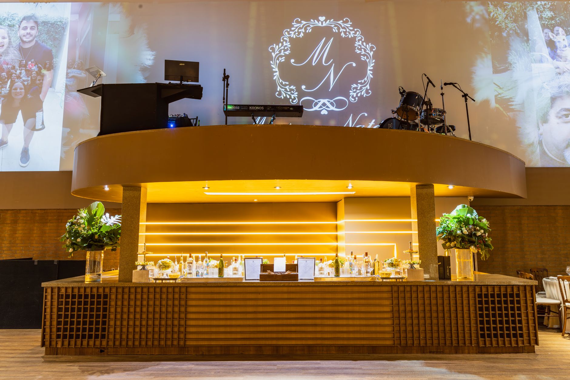 Luxurious wedding bar setup with modern decor and elegant lighting at an upscale venue.