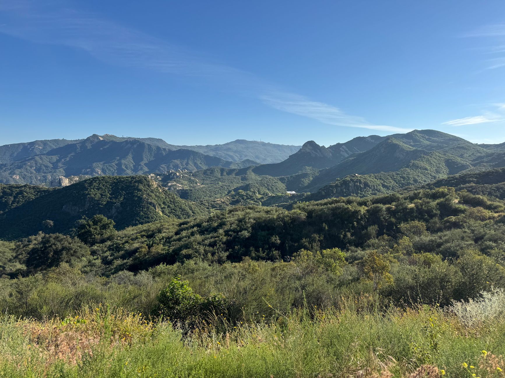 Scenic landscape of Santa Monica Mountains under a clear blue sky.