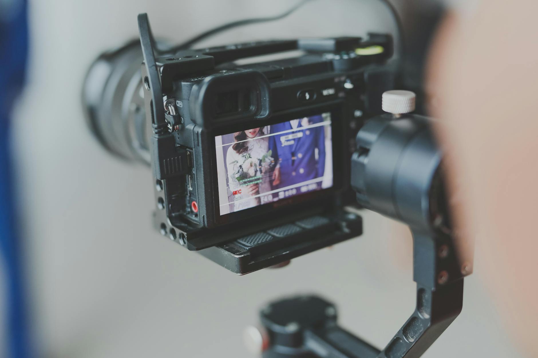 Close-up shot of a professional DSLR camera recording a scene. Perfect for media and technology contexts.